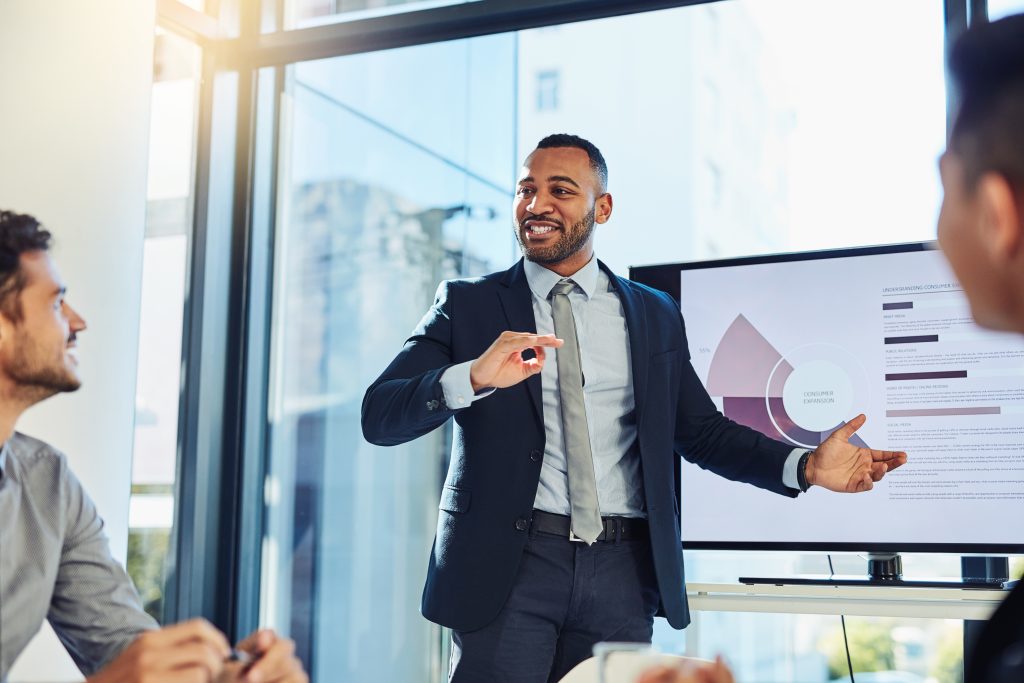 Business man presents data | RiskSphere