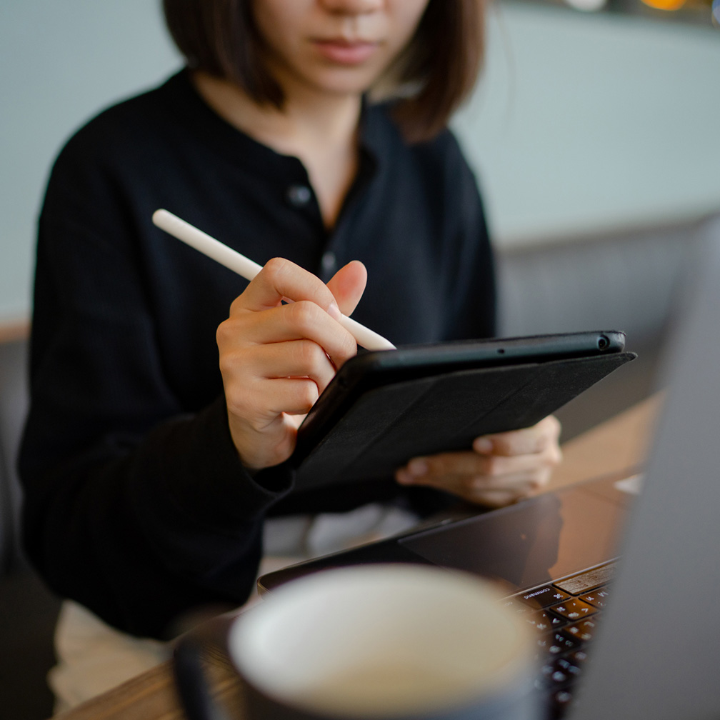Woman working on iPad
